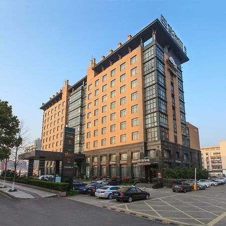 Four Seasons Rayli Hotel Нинбо Экстерьер фото