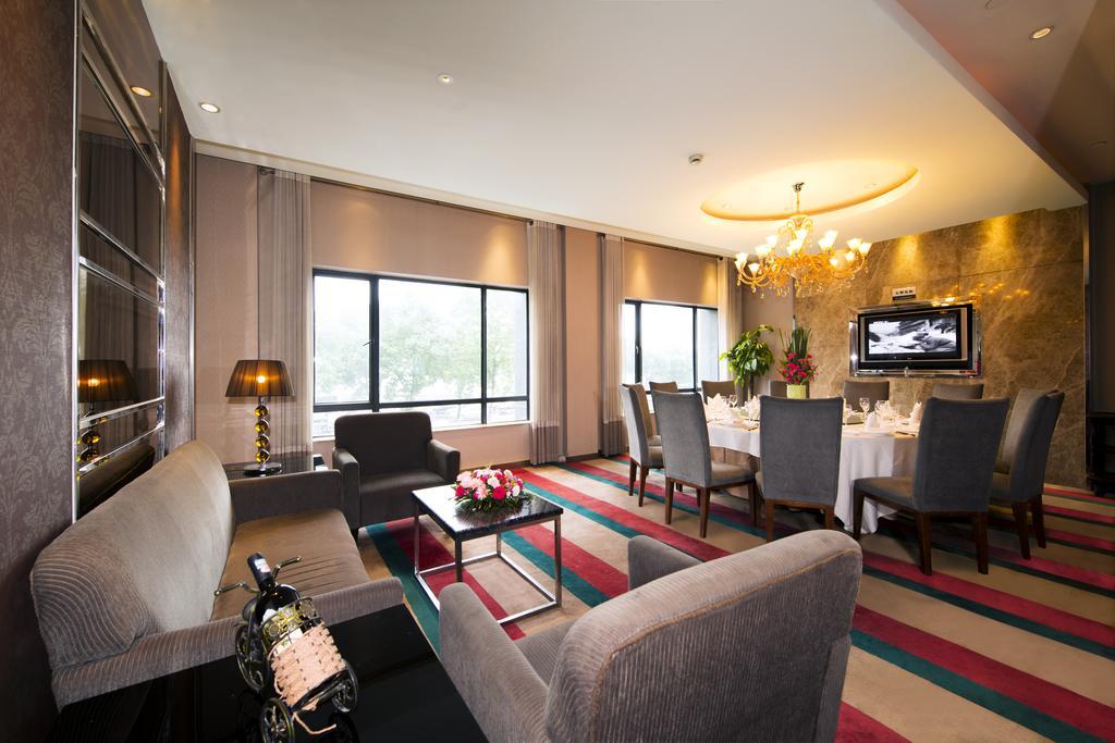 Four Seasons Rayli Hotel Нинбо Экстерьер фото