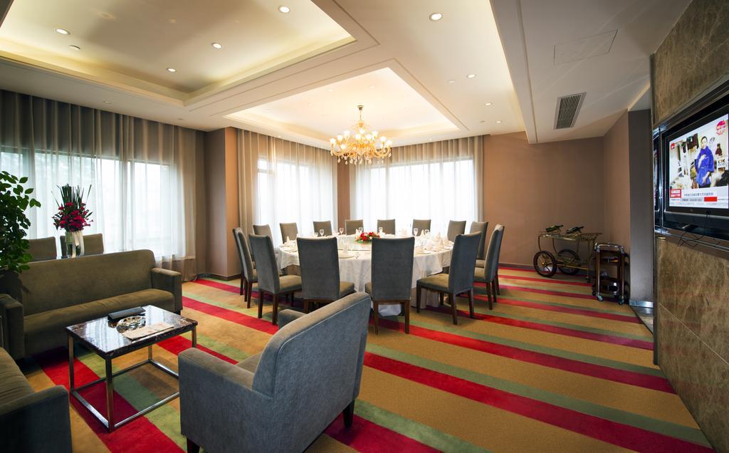 Four Seasons Rayli Hotel Нинбо Экстерьер фото