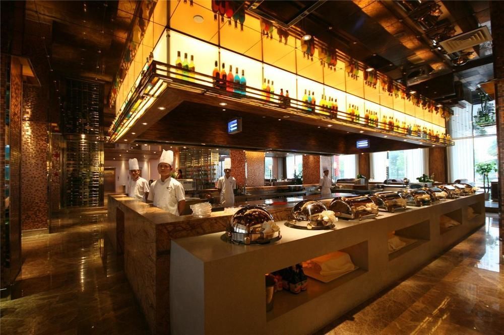 Four Seasons Rayli Hotel Нинбо Экстерьер фото