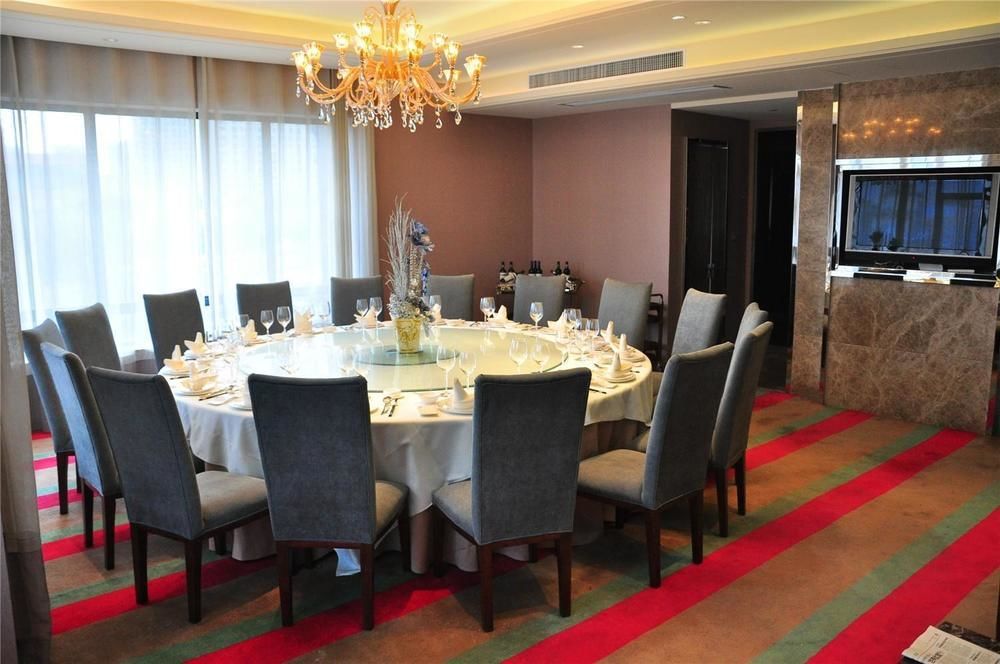 Four Seasons Rayli Hotel Нинбо Экстерьер фото