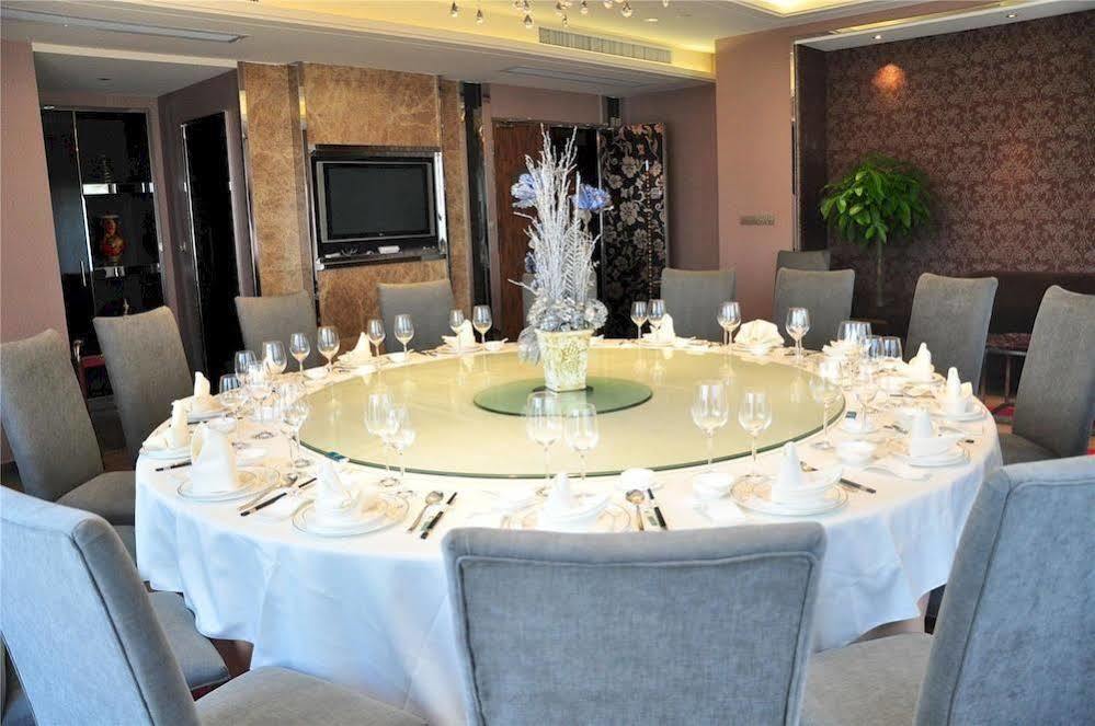 Four Seasons Rayli Hotel Нинбо Экстерьер фото