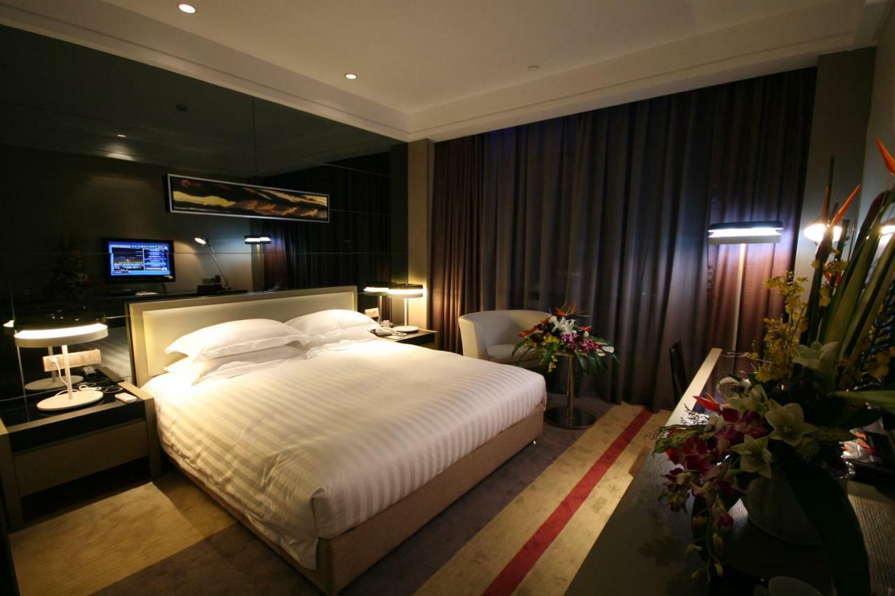 Four Seasons Rayli Hotel Нинбо Экстерьер фото