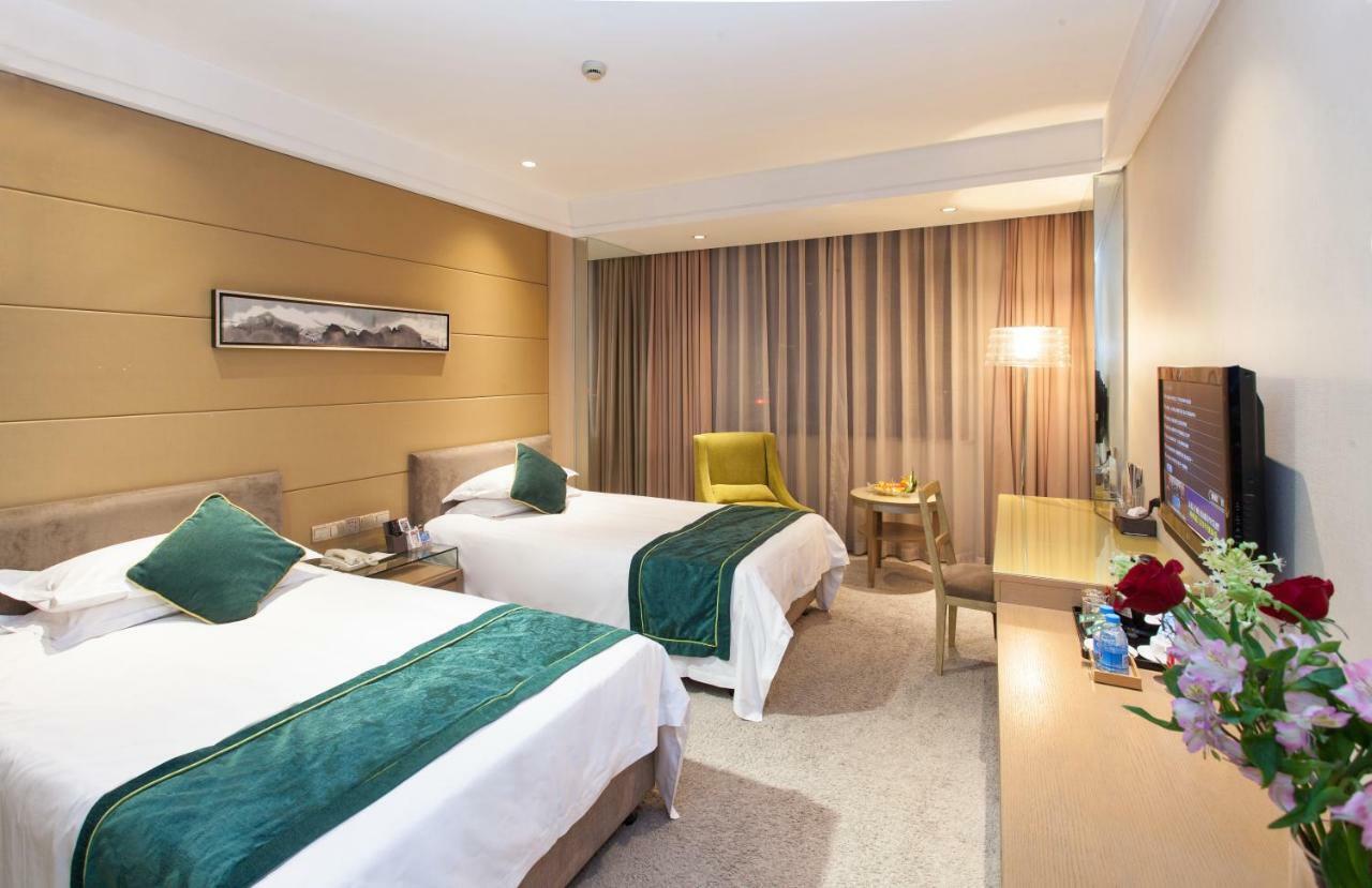 Four Seasons Rayli Hotel Нинбо Экстерьер фото
