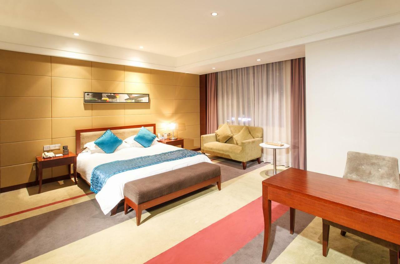 Four Seasons Rayli Hotel Нинбо Экстерьер фото
